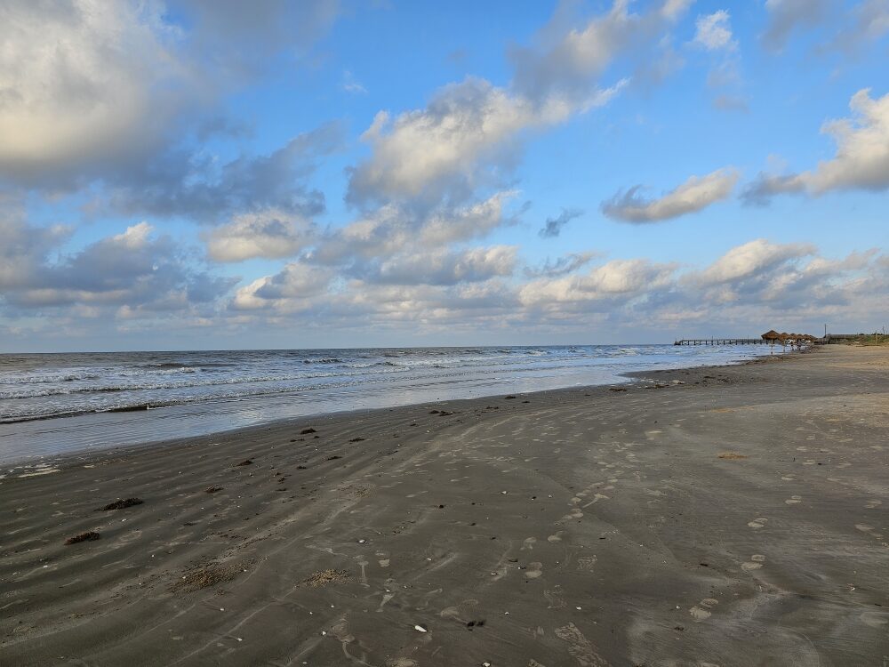 A wide stretch of empty beach